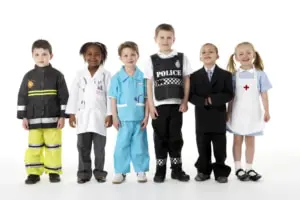 Young Children Dressing Up As Professions independent work with Montessori geography materials